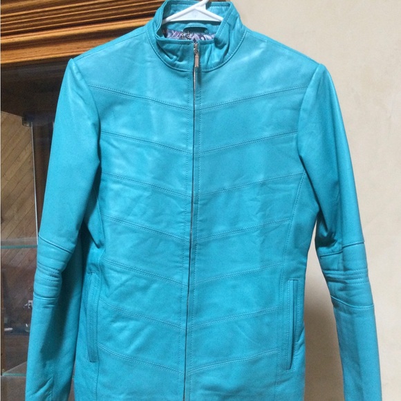 Turquoise leather jacket worn once. - Picture 1 of 4